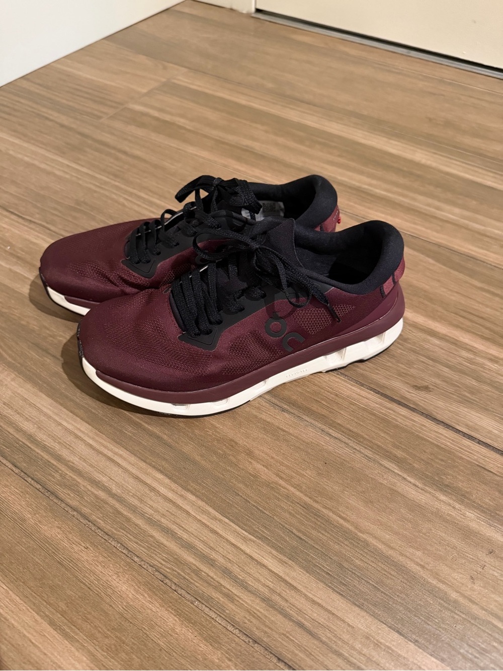 On Running Burgundy and Black Women's Sneakers